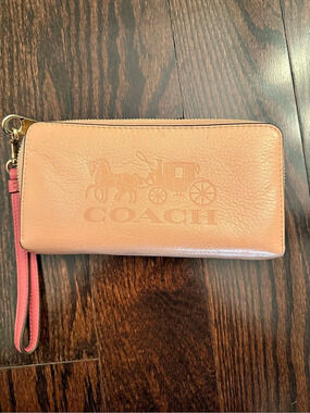 Coach Peach Leather Zip Around Wristlet Wallet